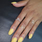 Certified Fancy initial Diamond Ring in 9kt Gold