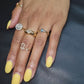 Certified Fancy initial Diamond Ring in 9kt Gold