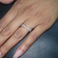 Certified 0.10ct Diamond crossover ring in 9kt Gold