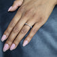 Certified 0.10ct Diamond crossover ring in 9kt Gold