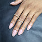 Certified 0.10ct Diamond crossover ring in 9kt Gold